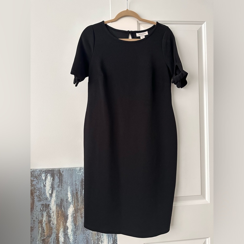 Black maternity dress with bow detail